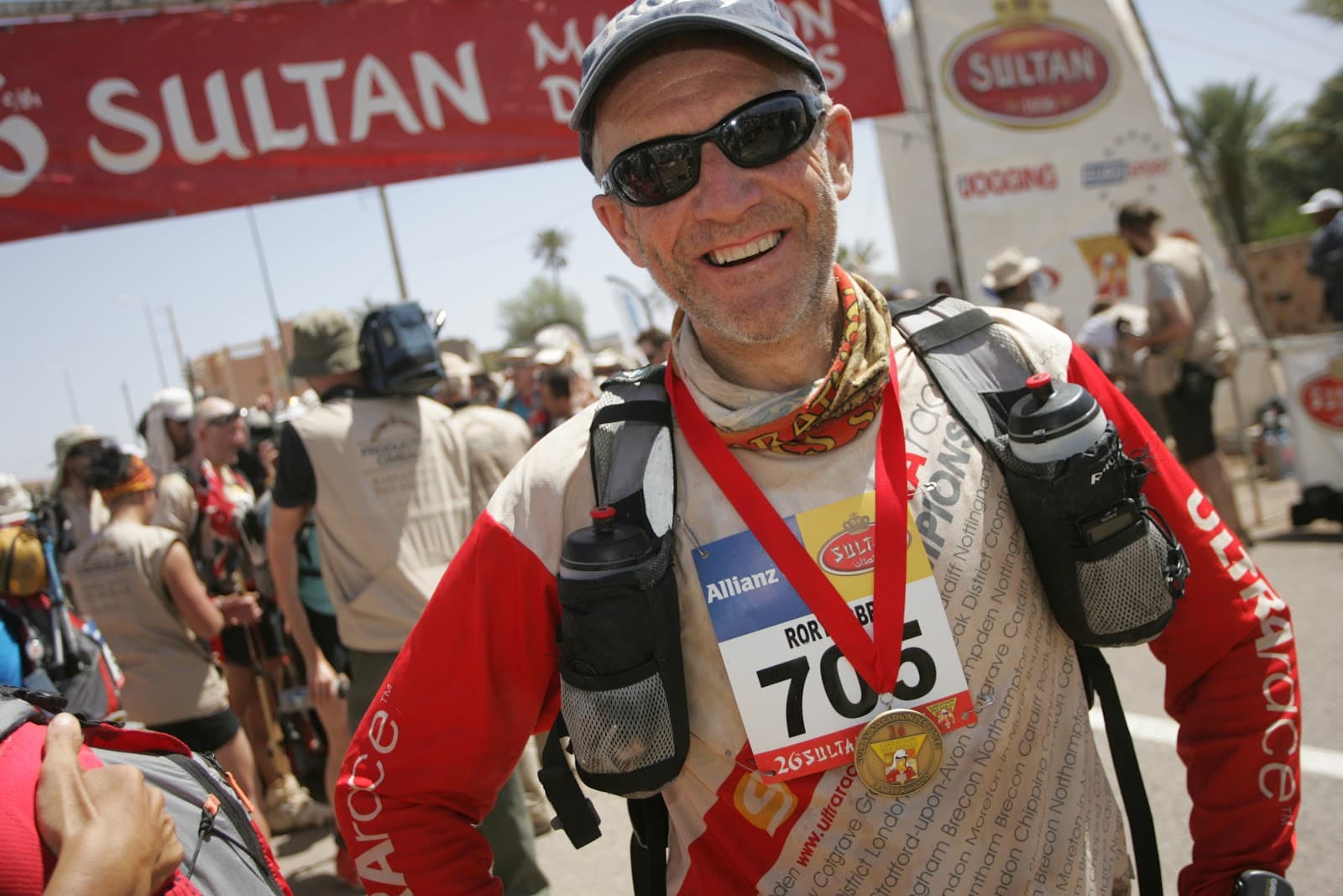 Rory Coleman crossing a Marathon des Sables finish line